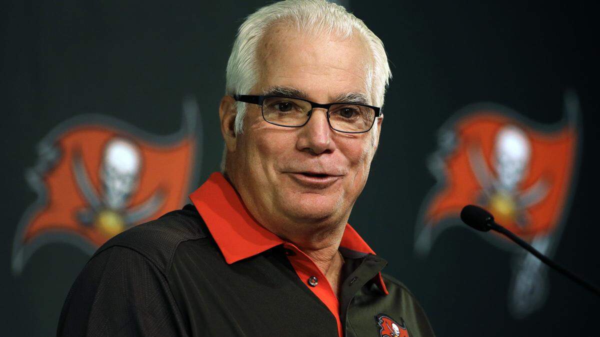 New Tampa Bay Buccaneers defensive coordinator Mike Smith answers a question during a news conference Wednesday, Jan. 20, 2016, in Tampa, Fla. Smith had been a head coach with the Atlanta Falcons. (AP Photo/Chris O'Meara)