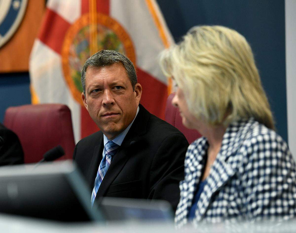 The Manatee Board of County Commissioners, including Commissioner George Kruse, voted to move a policy forward which would allow county employees to carry guns to work.