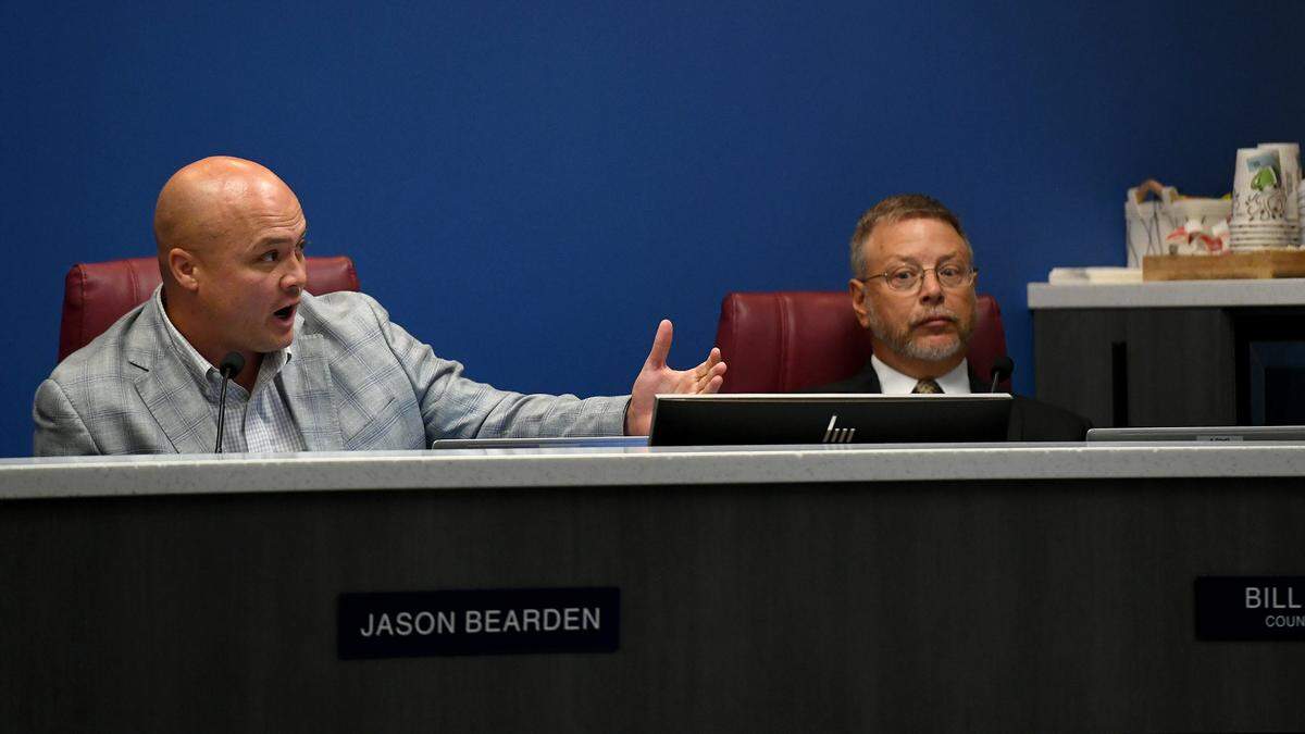 Commissioner Jason Bearden and County Attorney Bill Clague during the Board of Commissioners meeting on April 25, 2023.