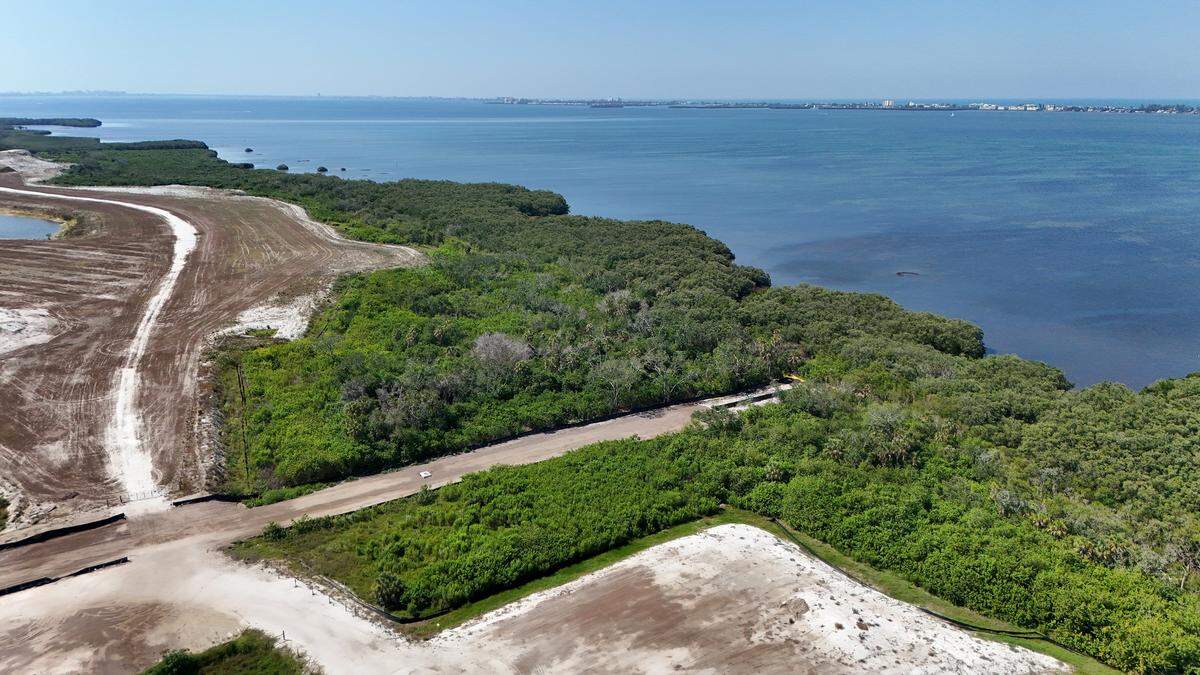 Views of the developments along El Conquistador Parkway on Sarasota Bay called Aqua and Cirrus.
