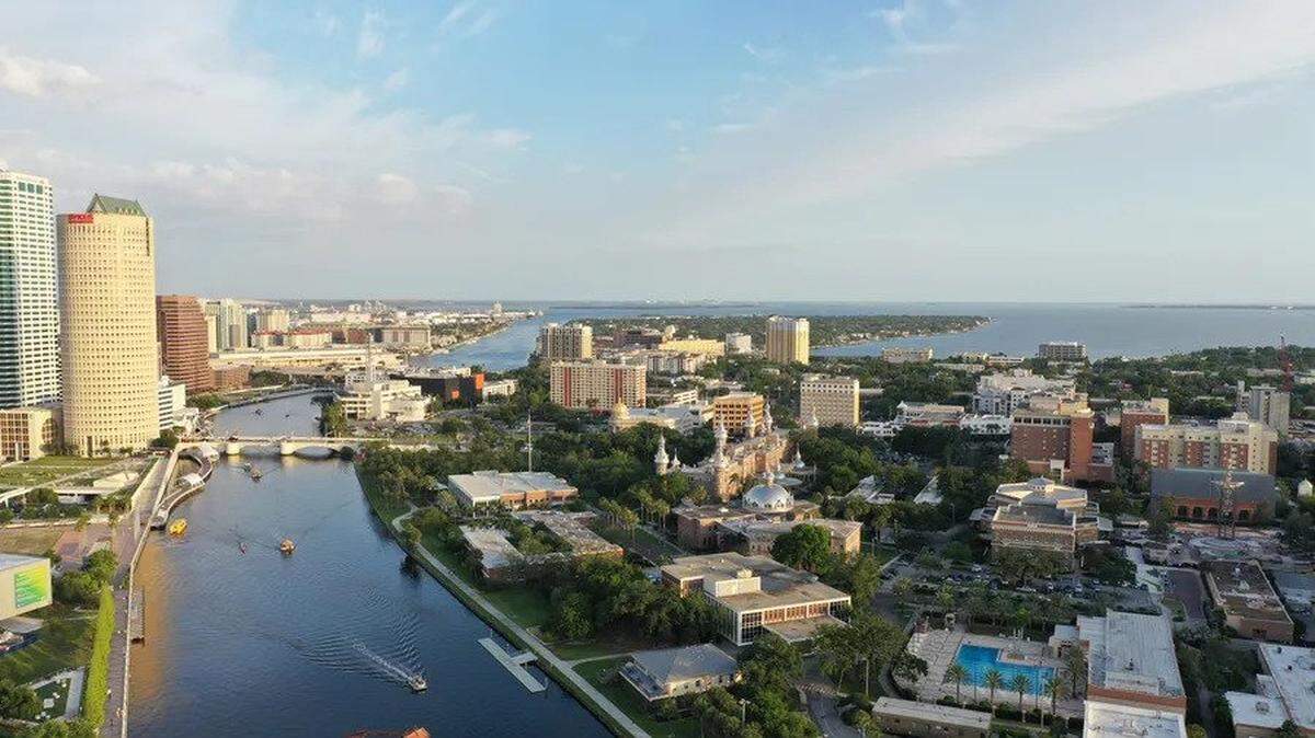 This photo of downtown Tampa overlooks the Tampa Riverwalk, University of Tampa, and Hillsborough River in April. Guess what this land used to be called?