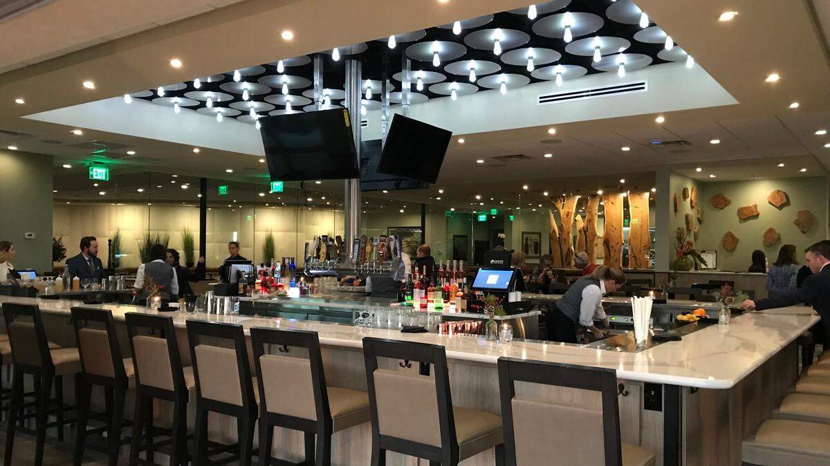 The central bar area of Grove restaurant at Lakewood Ranch was a popular gathering place during a sneak peek this week. The restaurant opens for lunch and dinner Monday, Dec. 10.