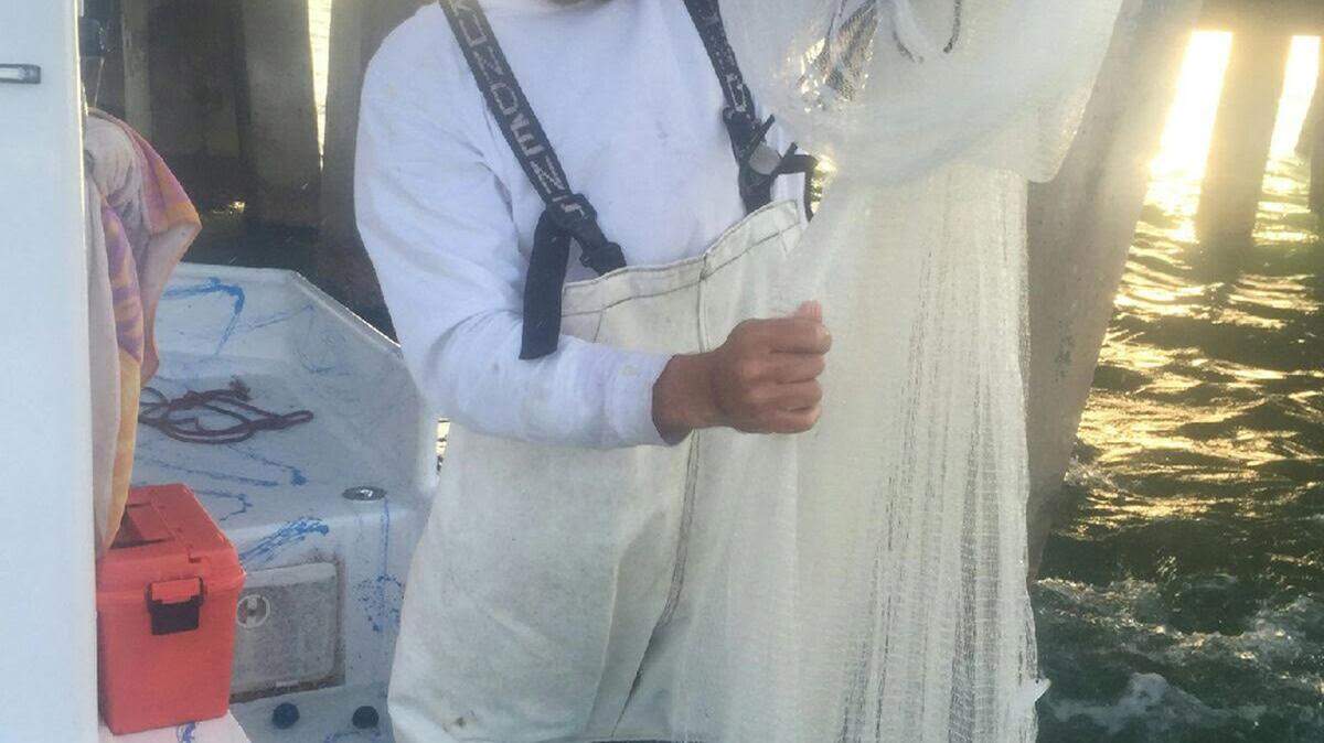 Trey Daugherty gathers bait to sell to area anglers. PROVIDED PHOTO