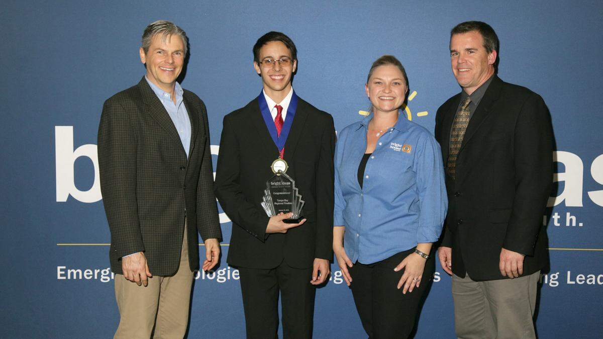 Xavier Almeyda, second from left, poses with Deane Western, Educator, State College of Florida Collegiate School, Leah Brown, Senior Manager Government and Public Affairs, Bright House Networks and Charlie Kennedy, School Board Member of Manatee County School District after winning the regional Bright House Bright Ideas competition. PHOTO PROVIDED