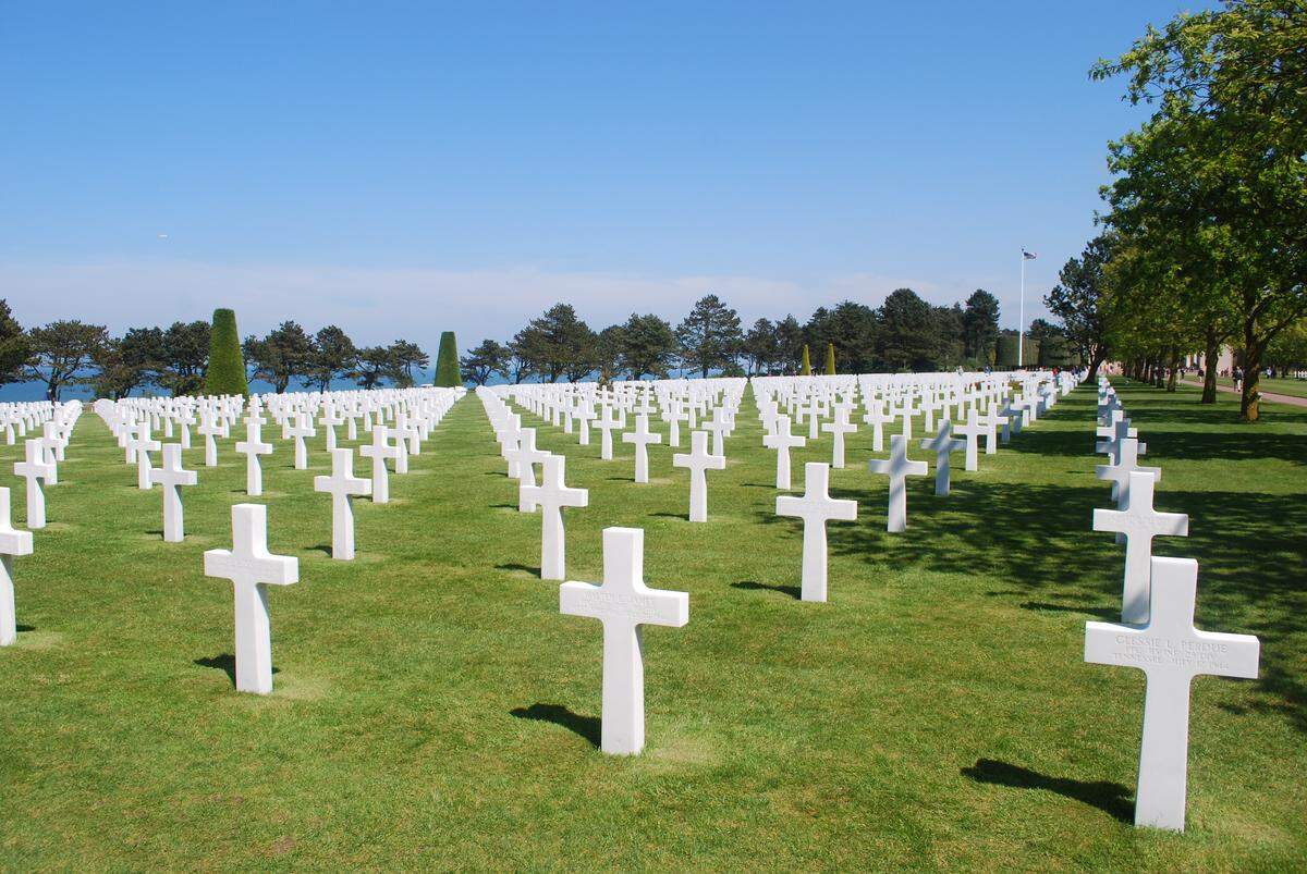 Normandy American Cemetery and Memorial contains the graves of more than 9,000 who fell fighting to liberate France from Nazi occupiers.