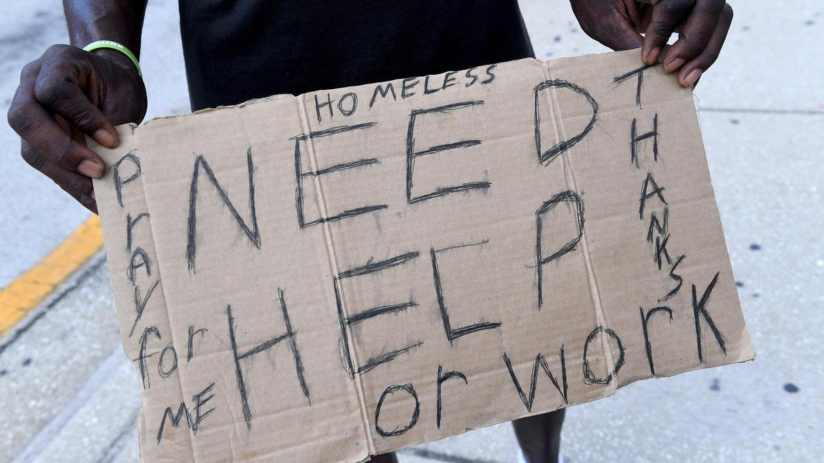 David Moore is a panhandler in Bradenton. He says he asks for donations to survive and avoid a life of crime.