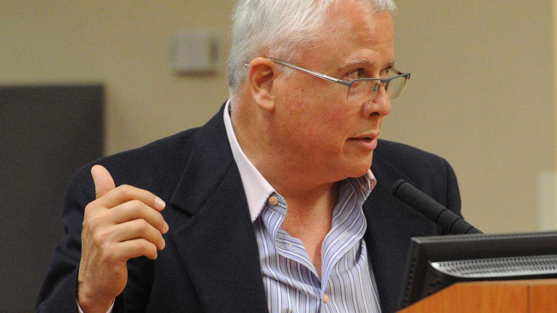 Developer Carlos Beruff talks about the home buyer as he speaks against raising impact fees on Thursday as Manatee County commissioners consider raising impact fees to pay for future growth in the county. 
 GRANT JEFFERIES/Bradenton Herald