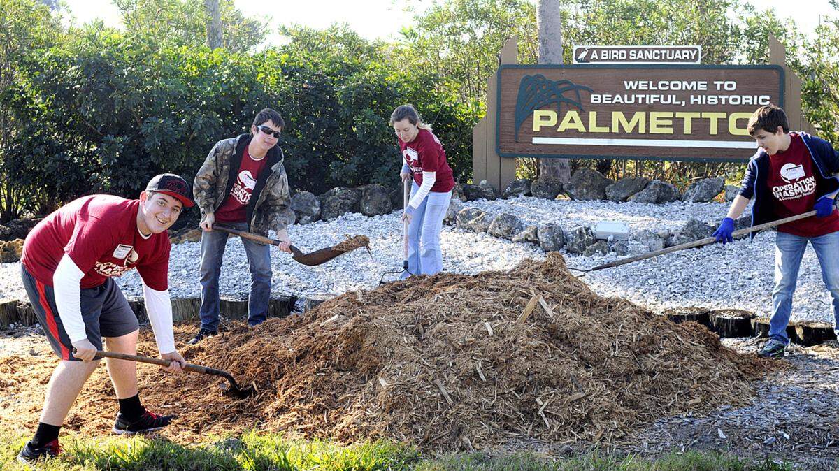 Operations Inasmuch teen volunteers, from left: Michael Santello, Christopher Miller, Emily Fleming and Logan Ridenour.PHOTO PROVIDED