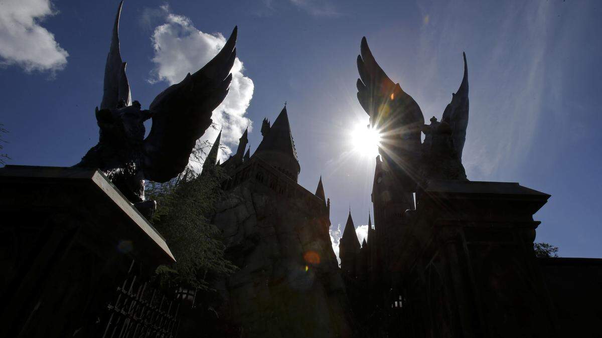 In this Thursday, Oct. 22, 2015 photo, the entrance to the Harry Potter and the Forbidden Journey ride is seen at Universal Studios in Orlando, Fla. In 2010 Universal Orlando opened one of the most successful attractions in theme park history, The Wizarding World of Harry Potter, with a second Potter area added in 2014. (AP Photo/John Raoux)