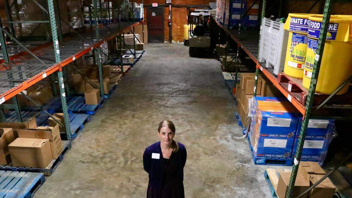 The shelves at the Food Bank of Manatee have gone increasingly bare amid soaring inflation and supply chain issues which have driven up the cost of food, fuel and housing. Shown April 26, 2022, above is Amy Towery, vice president of development for Bradenton-based Meals on Wheels PLUS of Manatee.