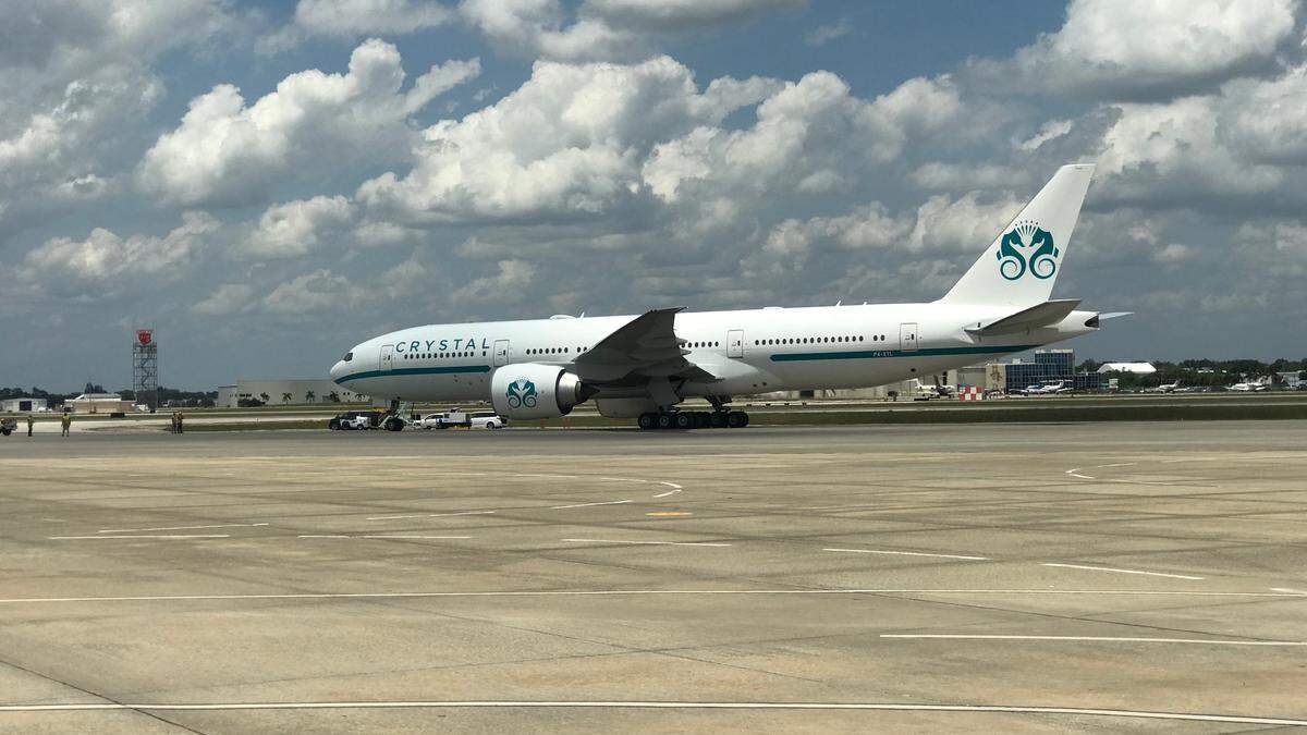 The Crystal Skye Boeing 777-200LR has a wing span of 212 feet, and is 169 feet long. It has a maximum range of 10,000 miles and a maximum speed of 587 mph.