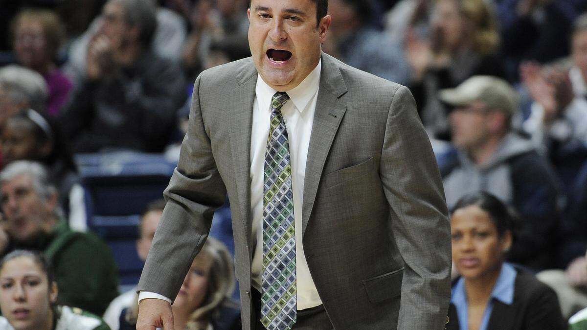 South Florida head coach Jose Fernandez yells instructions during a Feb. 29 game against Connecticut in Storrs, Conn. ASSOCIATED PRESS