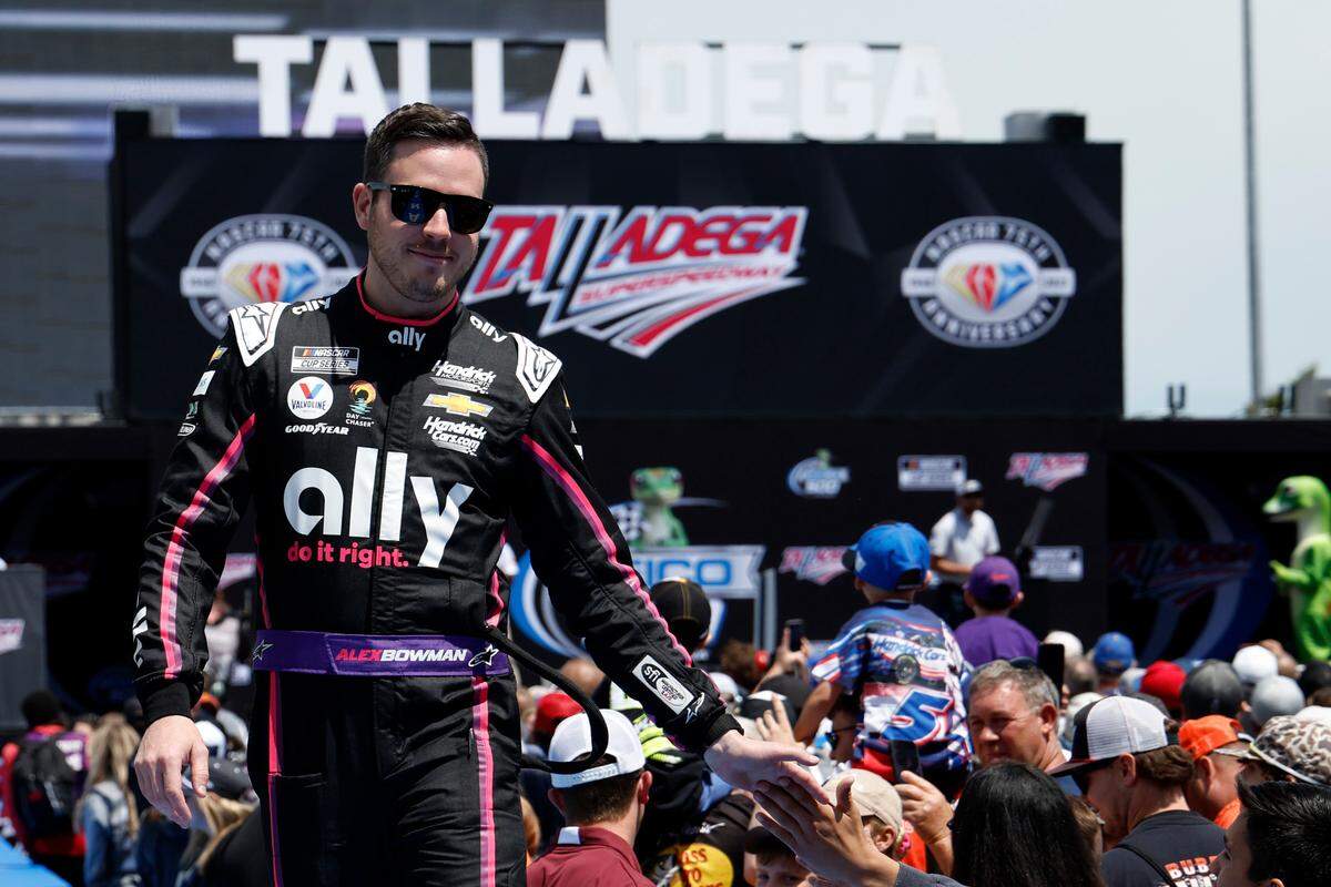 Alex Bowman greets fans before a NASCAR Cup Series auto race at Talladega Superspeedway, Sunday, April 23, 2023, in Talladega, Ala.