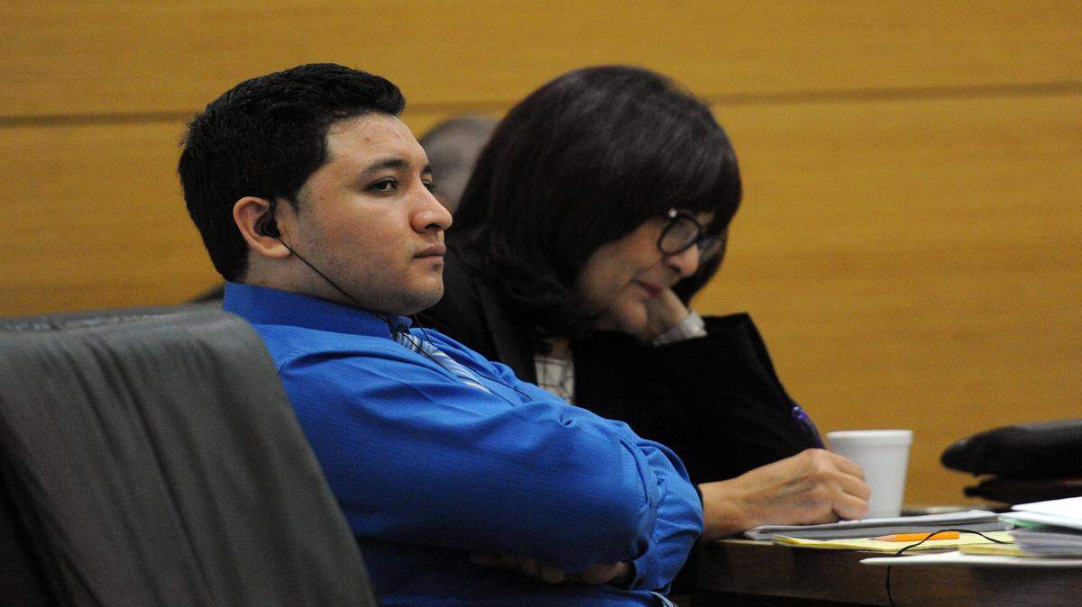 Melvin Quevedo listens to testimony during his manslaughter trial for the fatal stabbing of Herman Tabora-Discua in October 2014 after a fight outside of a Bradenton restaurant. 
 GRANT JEFFERIES/Bradenton Herald