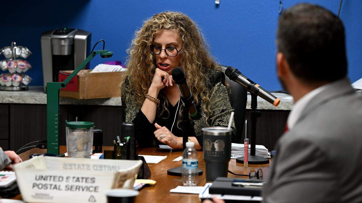 Judge Melissa Gould participates in the canvassing board as they verify signatures on mail-in ballots at the Manatee County Supervisor of Elections Office on Nov. 5, 2024.