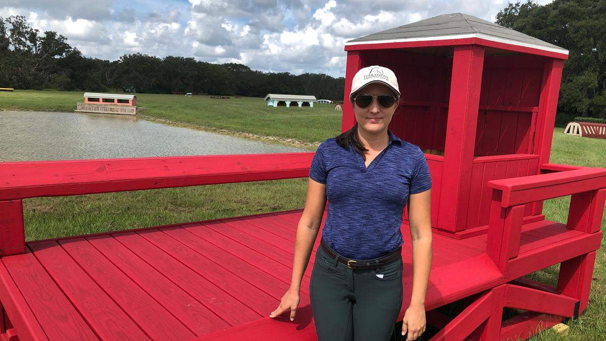 10/5/2021--Hannah Herrig Ketelboeter, co-founder of TerraNova Equestrian Center, stands next to one of the jumps in the cross country event planned for the venue’s inaugural competition Oct. 22-24.