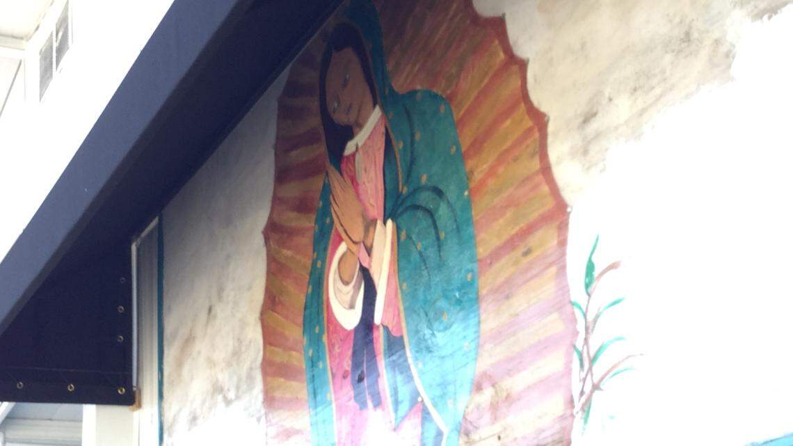 The Virgin Mary painting on the front of an elderly Bradenton woman’s trailer will stay after the two sides reached a settlement agreement.