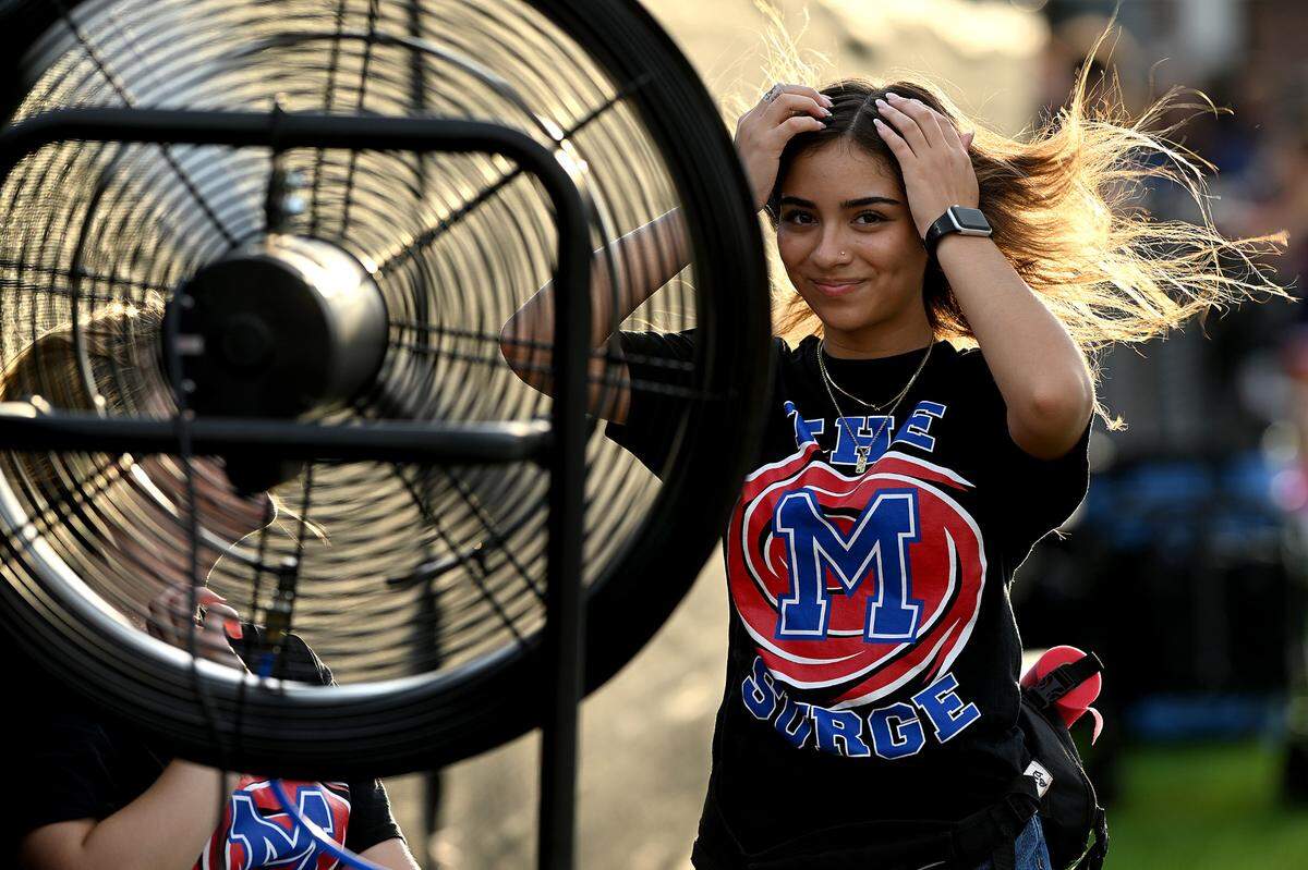 Manatee High trainer Kiara Cubas keeps cool before the game against Sarasota at Manatee High Friday, Sept. 1, 2023.