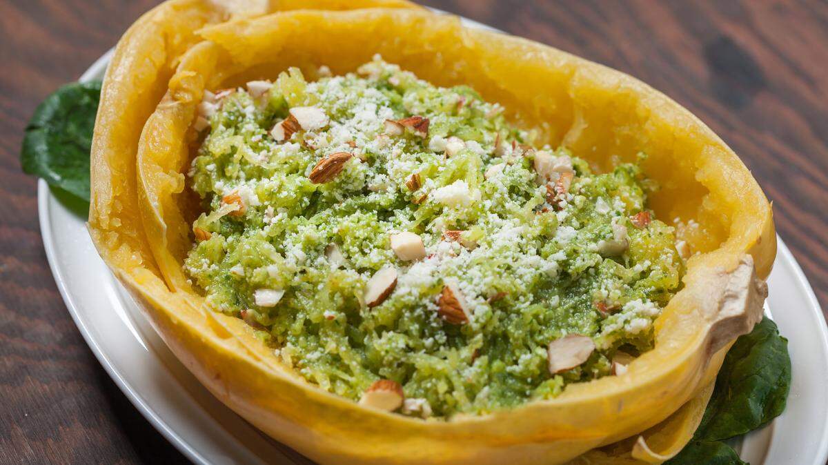 Spaghetti squash with almond-arugula pesto. Goran Kosanovic for The Washington Post