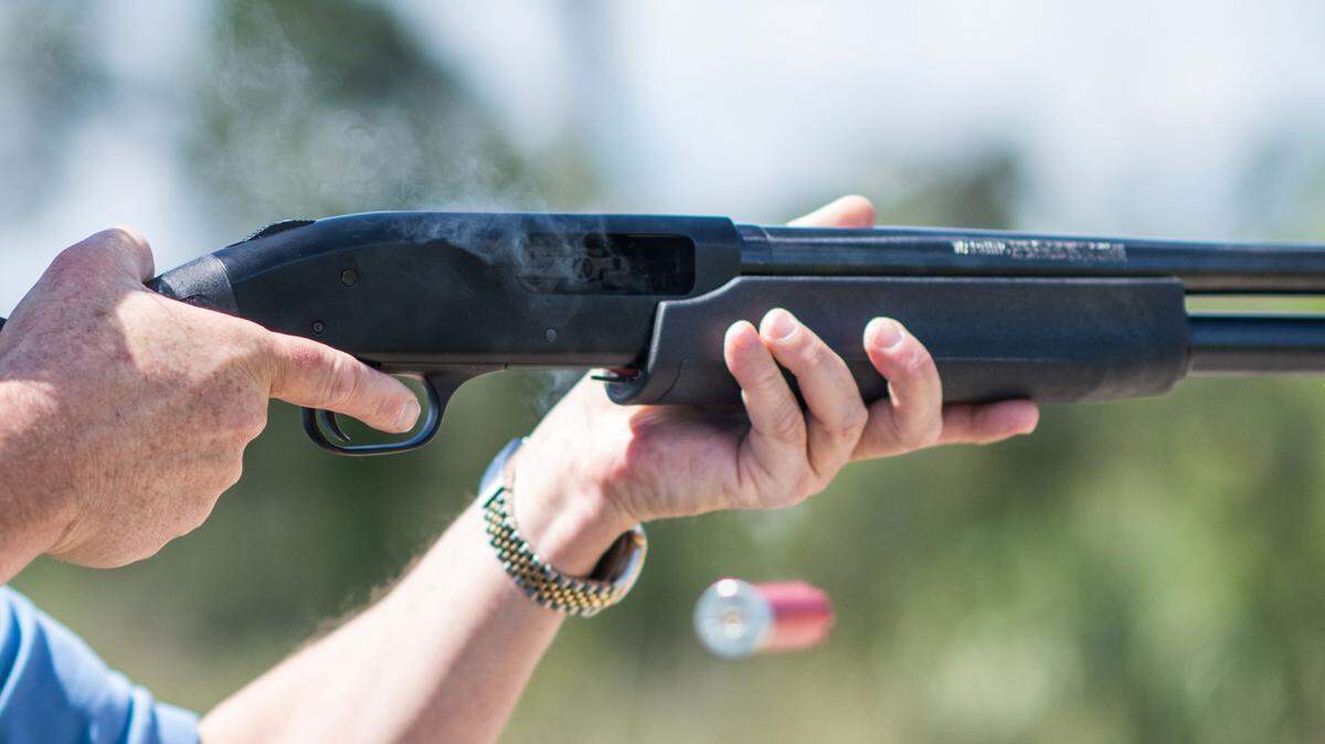 In this photo taken April 7, 2016, Jonathan Mossberg, whose iGun Technology Corp. is working to develop a "smart gun," demonstrates the firearm, in Daytona Beach, Fla. Mossberg is among a group of pioneers looking to build a safer gun. But unlike many others, he was in the gun business when he started down that path. Mossberg has been working to develop and someday bring to market a firearm that can't be fired by the wrong person, but works without fail in the hands of its owner in a life-or-death situation. (AP Photo/Lisa Marie Pane)