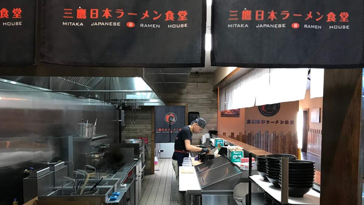 Chef Wei Ren makes a bowl of tonkotsu ramen soup at Mitaka Japanese Ramen House, 6749 Manatee Ave. W., Bradenton.