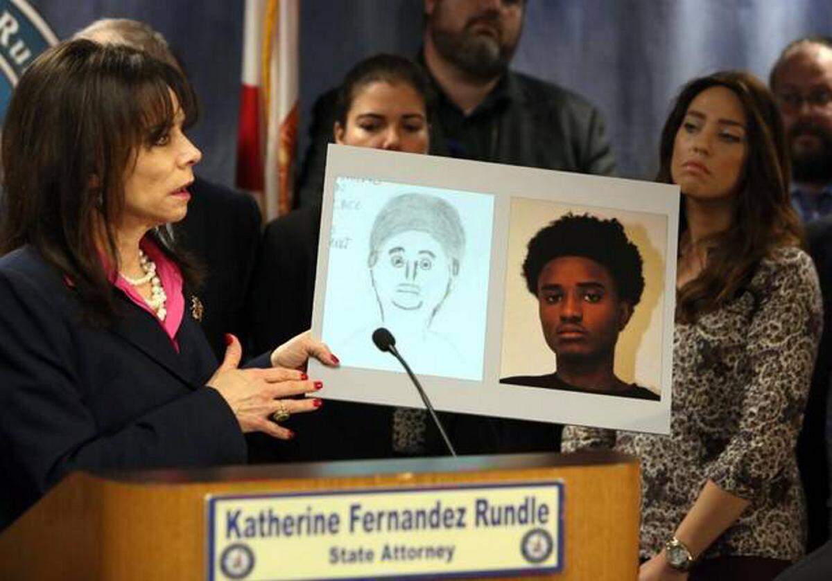 Miami-Dade State Attorney Katherine Fernandez Rundle holds a sketch and photo of the teenager arrested for the murder of Rabbi Joseph Raksin during a press conference on Dec. 9, 2015. The amateur sketch went viral on the Internet, with many people mistakenly believing the drawing was done by a police artist.