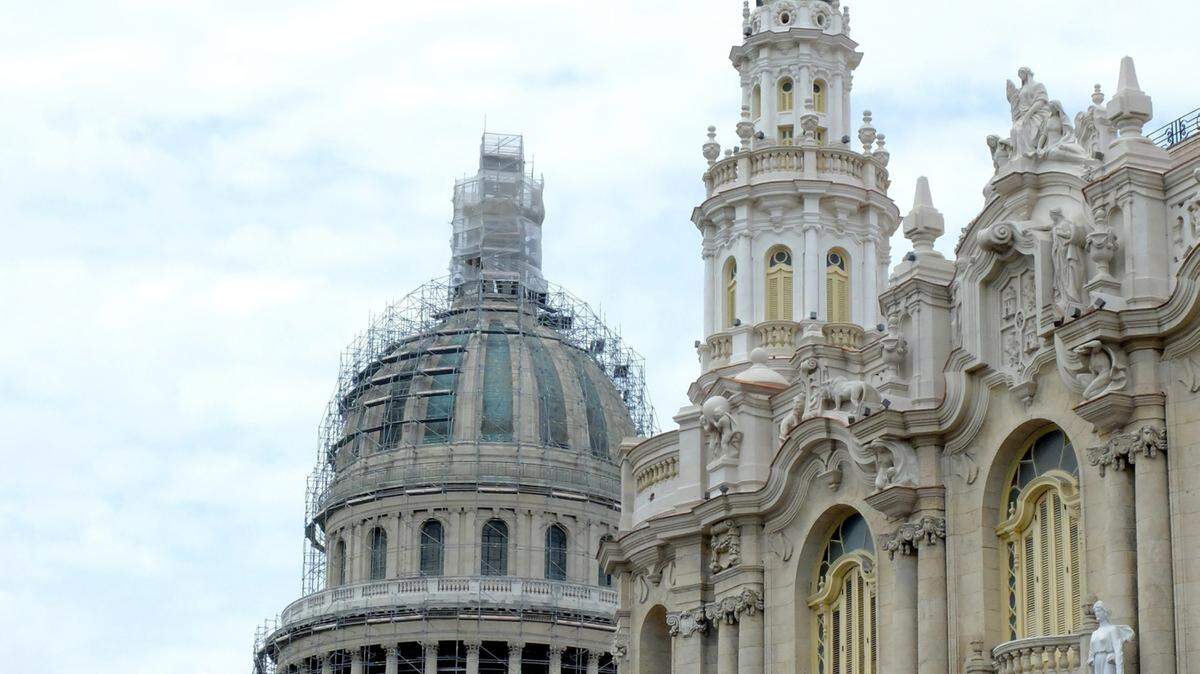 El Capitolio, left, and Teatro Nacional, right, in Havana, Cuba. The buildings are undergoing extensive renovation. MARK TREVOR BURRELL/Miami Herald/TNS