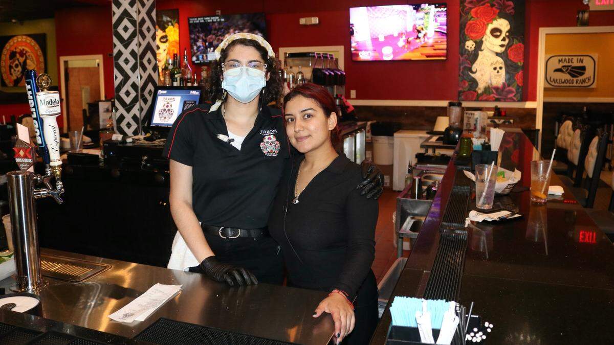 Takos Cantina Mexican Cuisine, 5770 Ranch Lake Blvd., opened in December in Ranch Lake Plaza, near Lakewood Ranch at the southeast corner of Interstate 75 and State Road 70. Shown above are  Natalia Castro, left, and Ana Sanchez. Photo taken March 1, 2022.