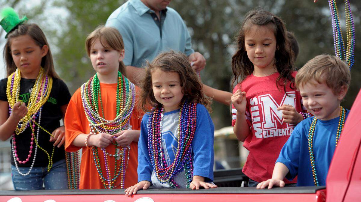 Students from Mills Elementary ride in the 30th annual Parrish Heritage Day Parade on Saturday in Parrish.GRANT JEFFERIES/Bradenton Herald