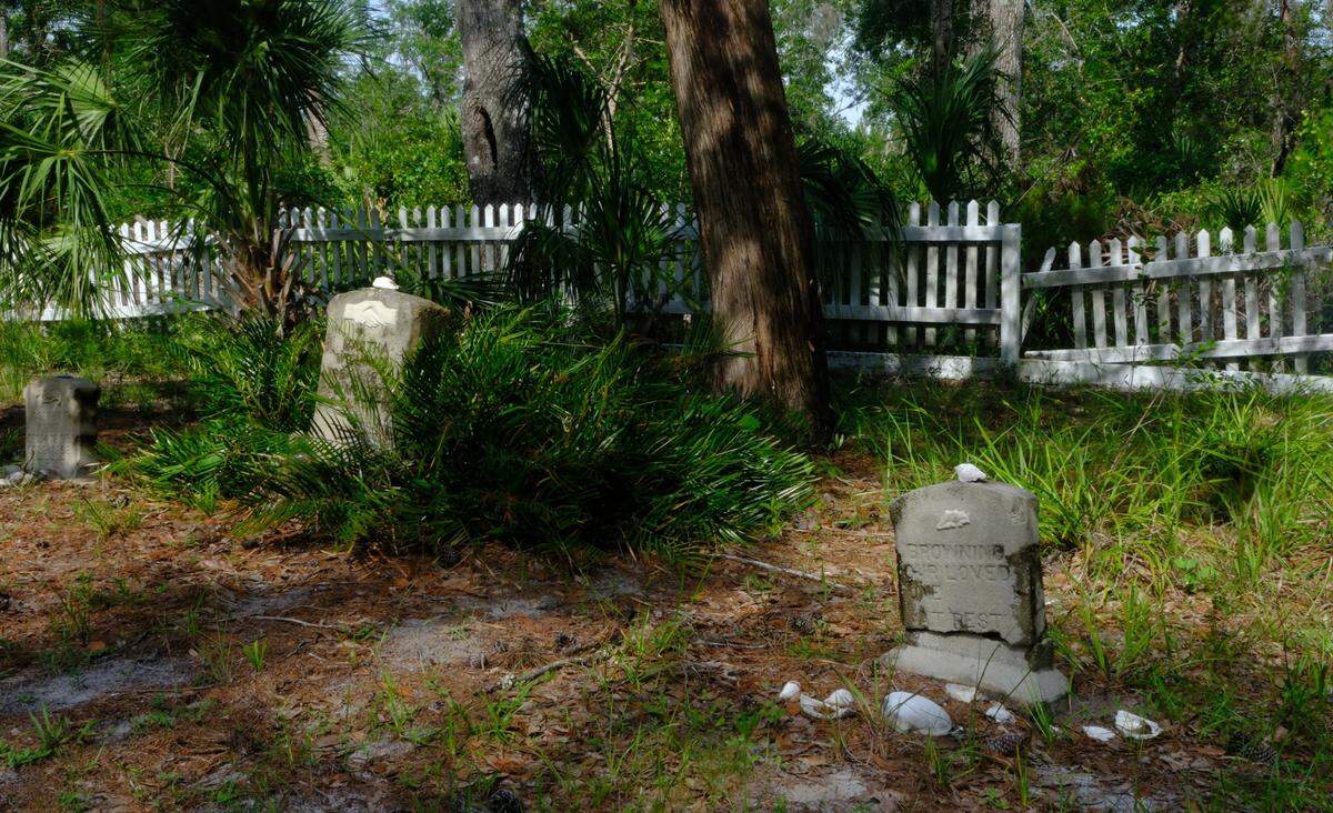 Manatee County is using voter-approved conservation funds to purchase 4.5 acres of forested land around the Rye Cemetery and Rye Preserve in Parrish to shield the area from future development. The cemetery is pictured on June 18, 2025.