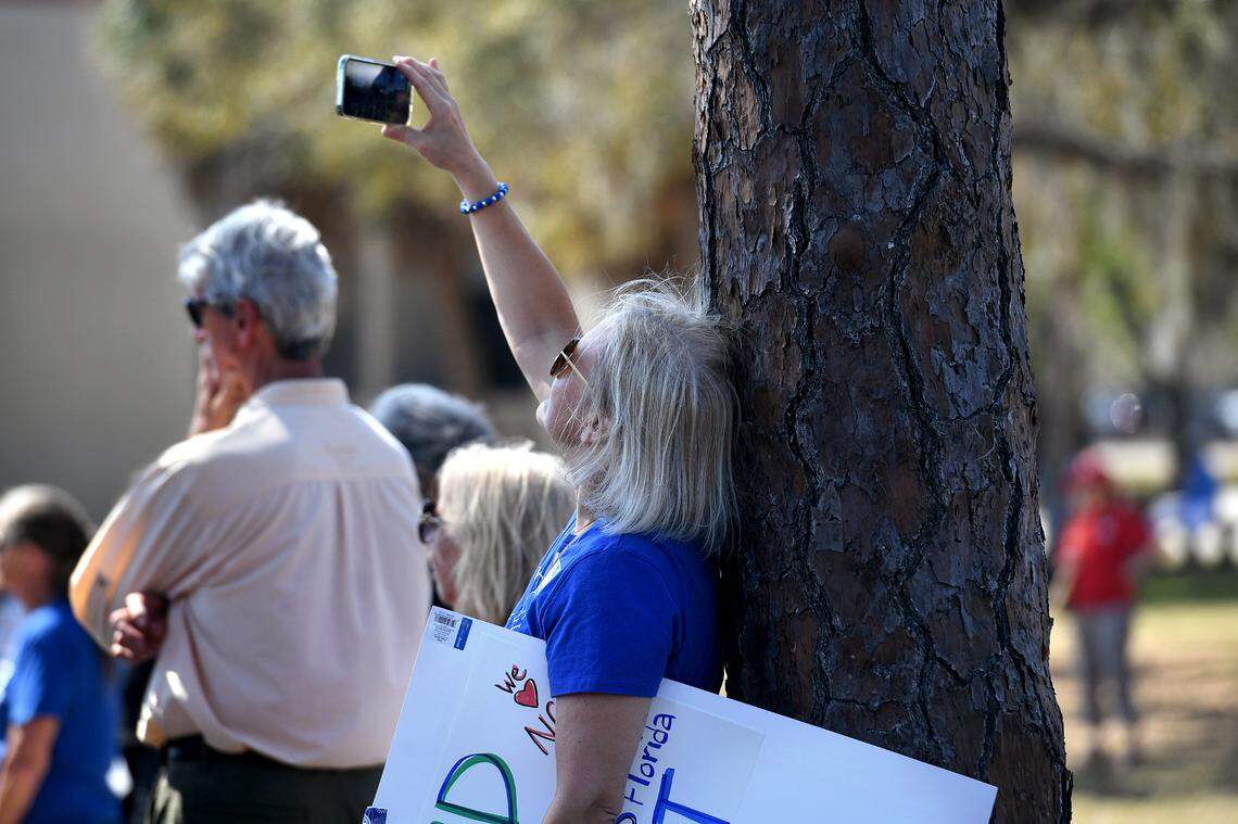 Students, faculty and alumni gathered near the Sudakoff Center at New College on Feb. 28 before a meeting of the new board of trustees to make passionate speeches. They shared their experiences and hopes for an inclusive and diverse student body to continue.