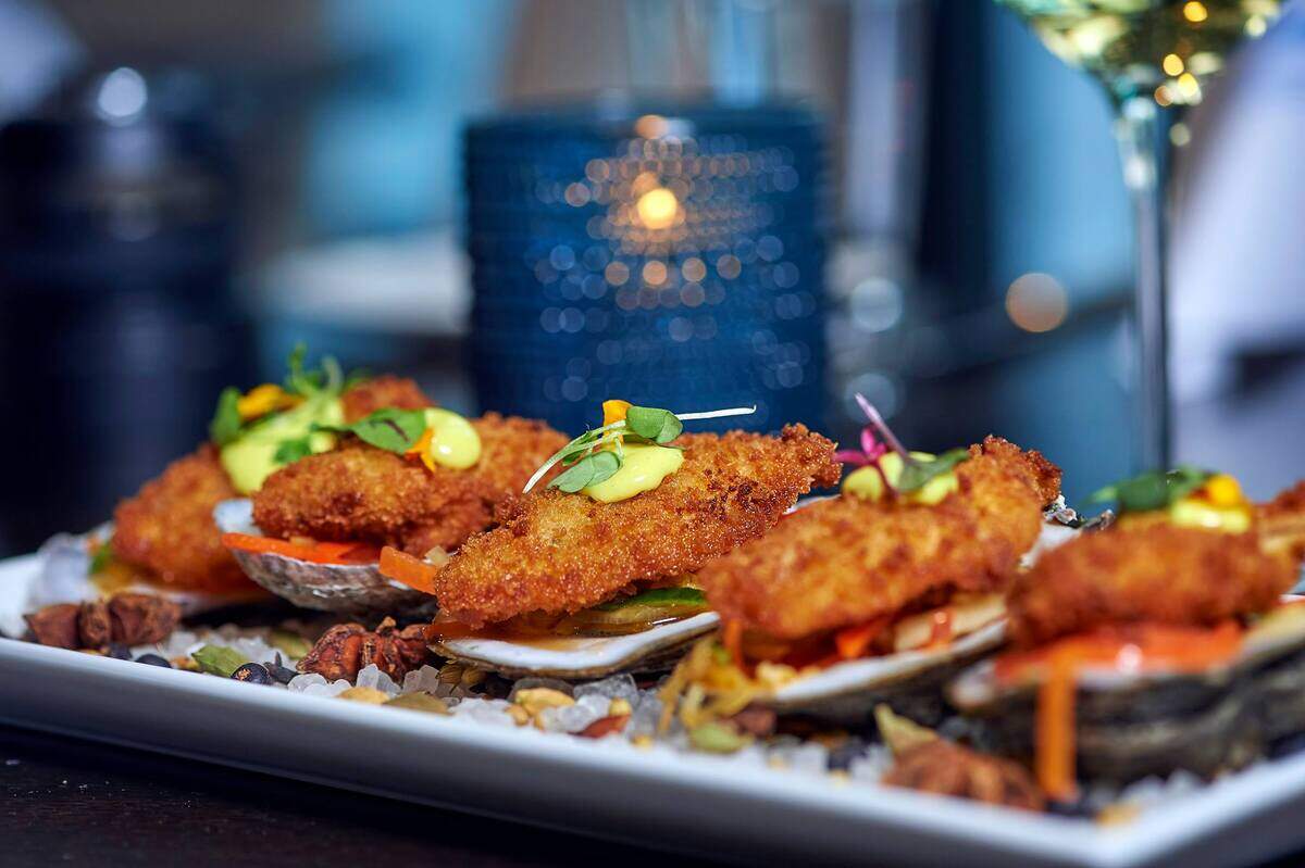 A dish of crispy fried oysters at Louies Modern in Sarasota is one meal that you can get for less during Savor Sarasota Restaurant Week.