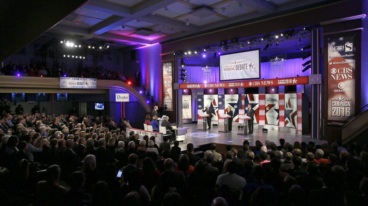 Democratic presidential candidates Bernie Sanders, left, Hillary Rodham Clinton and Martin O'Malley appear during a Democratic presidential primary debate, Saturday, Nov. 14, 2015, in Des Moines, Iowa. (AP Photo/Charlie Neibergall)