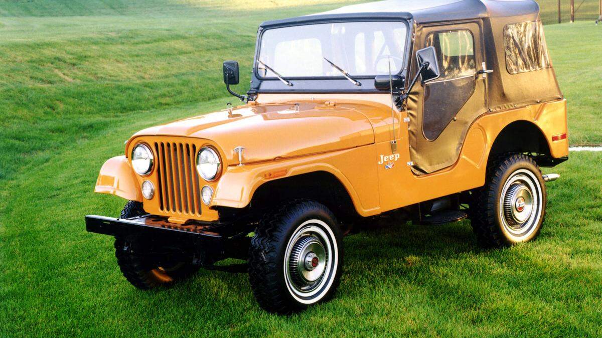 Arguably one of the ugliest Jeep variants due to its "Transport Yellow" paint, the 1973 CJ-5 features a soft top and white wall tires. (Jeep)