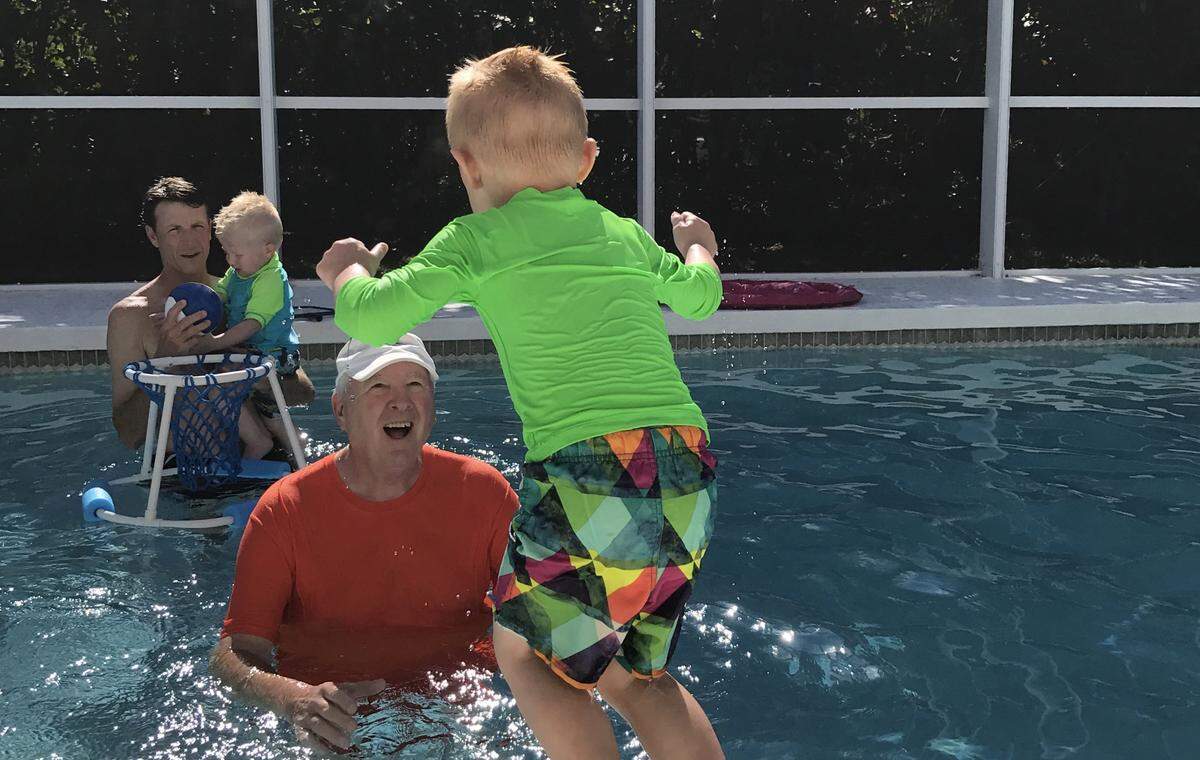 Lakewood Ranch Wayne Sternberg had a passion for family life and is shown above playing with a grandson in the pool.