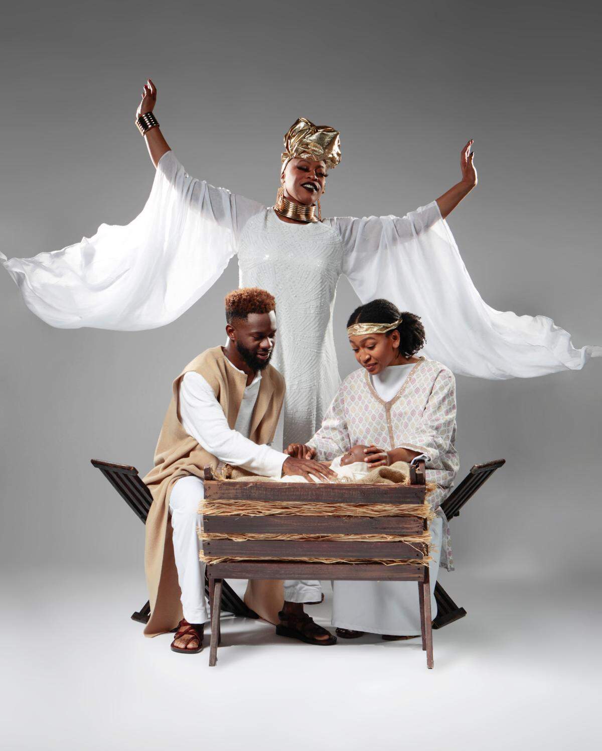 The Archangel (Stephanie Zandra), Joseph (Raleigh Mosely II) and Mary (Maicy Powell) appear in Westcoast Black Theatre Troupe’s popular annual rendition of “Black Nativity,” a gospel musical.