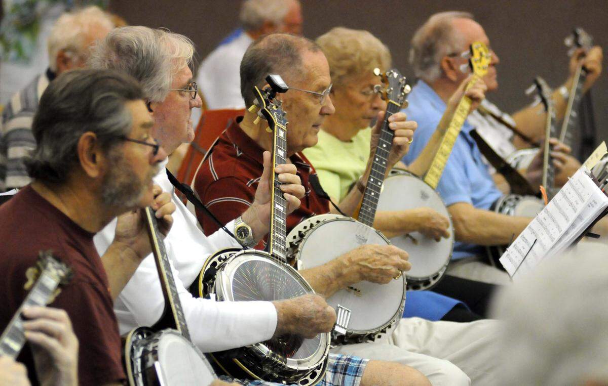 2/23/2012-- Banjo players were at the heart of the Suncoast Mummers String Band, shown during a 2012 rehearsal at the Westminster Presbyterian Church.