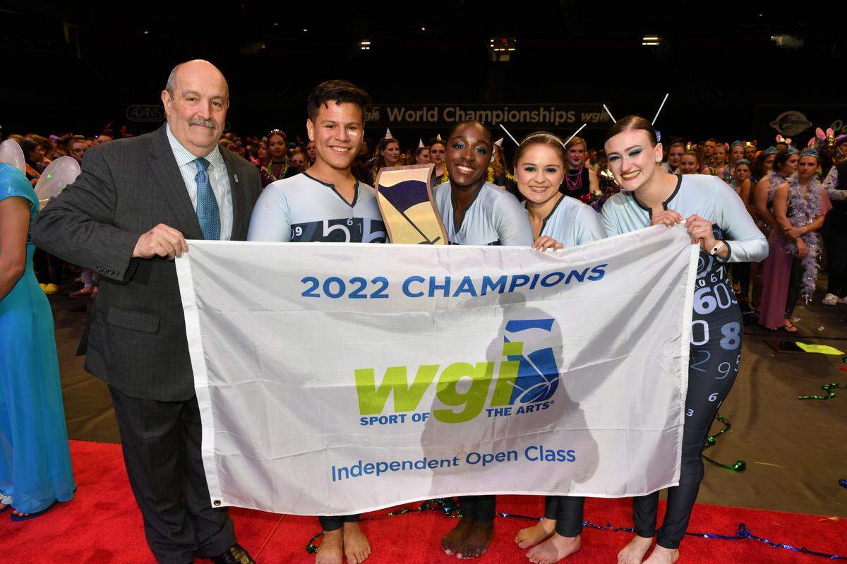 Members of University of South Florida in Tampa hold their first place banner at Winter Guard International World Championships in Dayton, Ohio on April 9, 2021.