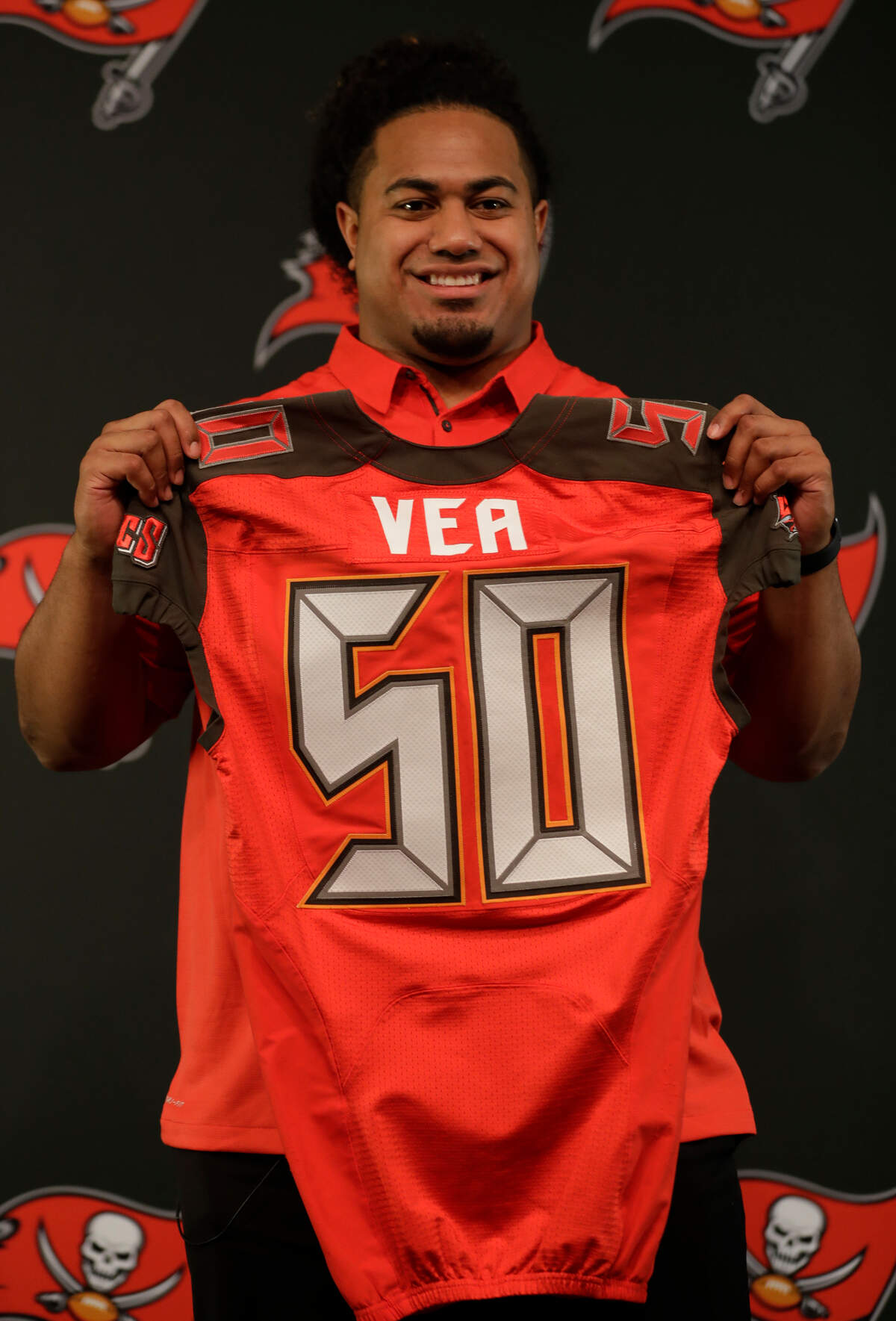Tampa Bay Buccaneers first-round draft pick Vita Vea meets the media during a news conference Friday, April 27, 2018, in Tampa, Fla. Vea, a defensive lineman, played his college football at Washington. (AP Photo/Chris O'Meara)