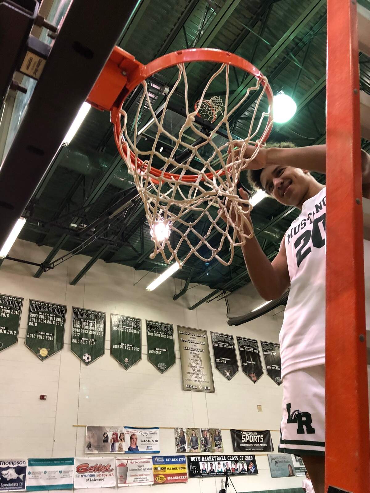 Keon Buckley cuts down the net after Lakewood Ranch’s regional title game win last week. Buckley is the only remaining player from the 2017 team that reached the Final Four.