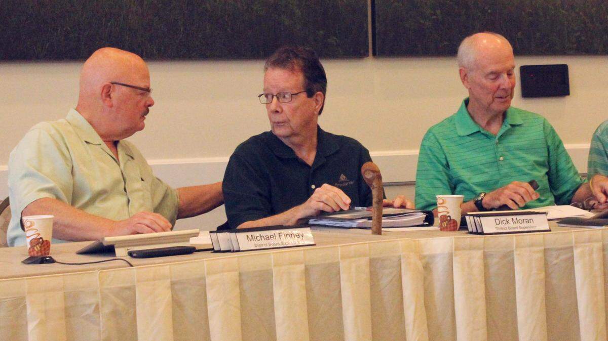 Dick Moran, district 2 supervisor at Lakewood Ranch, announced Thursday that he would not be seeking reelection. Shown above are, from left, supervisors Michael Finney, Moran, and Tom Green. 
 JAMES A. JONES JR./Bradenton Herald