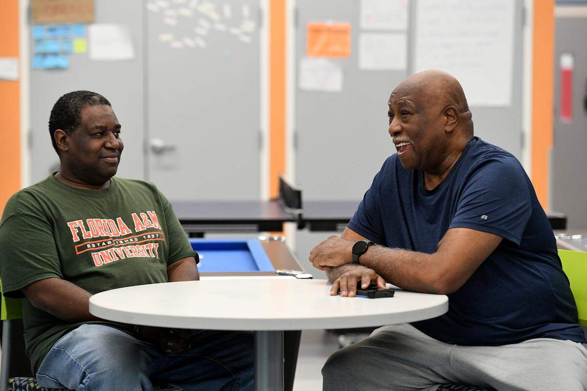 Willie Cooper (right) with former club member Kareem (Jabbar) White retired from the Boys and Girls Club after more than 40 years.