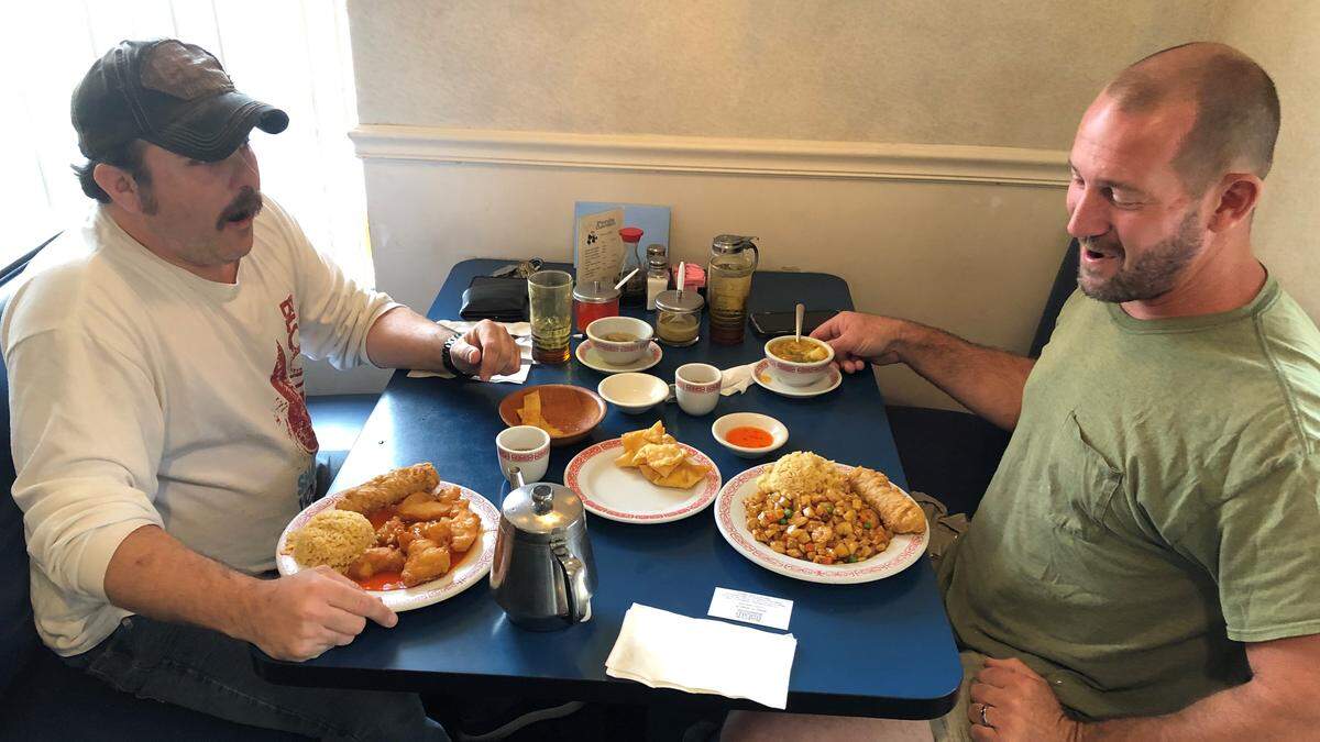 Brent Smith, left, and Guy Singletary have been long-time regulars at Panda Garden Restaurant, 3240 14th St. W., Bradenton, which is closing this week.