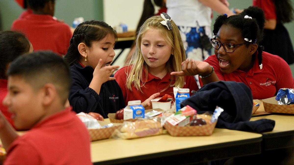 Students of Manatee Charter School enjoy their last lunch together of the school year. Manatee Charter School received a conditional two year extension on its contract, but the school will need to keep up with its teacher evaluations to stay open.