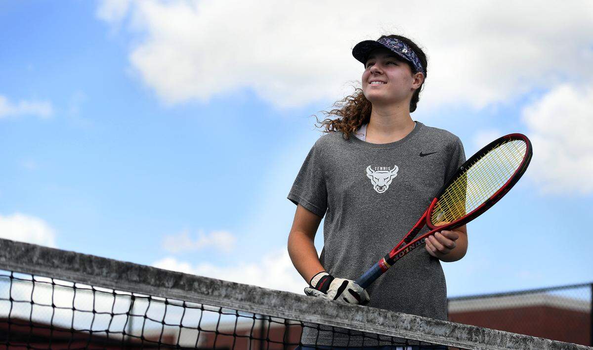 Odessa Eisch, 18, is a top tennis player at the Parrish Community School going to compete at states.