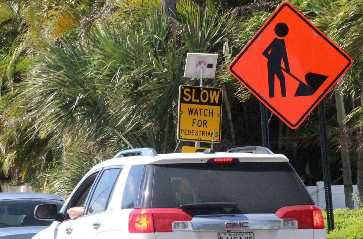 The City of Holmes Beach has installed solar-powered flashing lights at each of 14 S-curves warning drivers to slow down and watch for pedestrians.