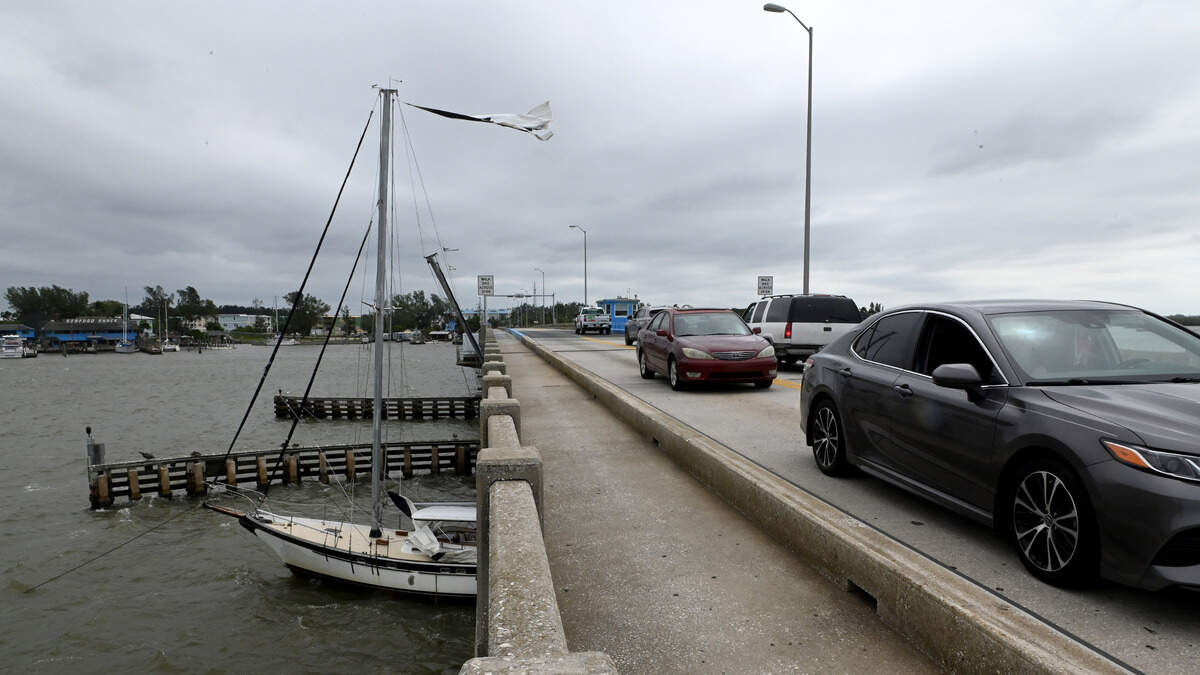 A sailboat became wedged under the Anna Maria Bridge after Hurricane Ian passed in Bradenton on Sept. 29, 2022.