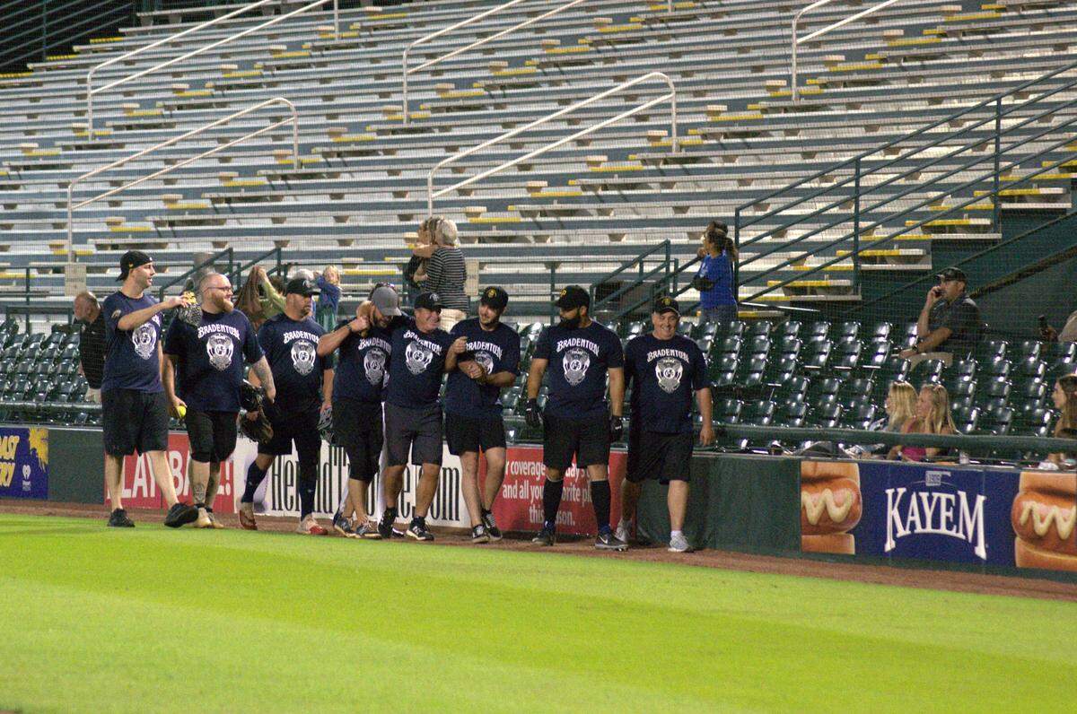 The Bradenton Police Department faced off against the Manatee County Sheriff’s Office in “Battle of the Badges,” a baseball match for charity at LECOM Park on Tuesday.
