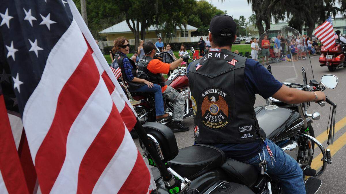 Motorcycle riders from several local veterans associations take part in the Veterans Day Parade on Wednesday in Palmetto. 
 GRANT JEFFERIES/Bradenton Herald