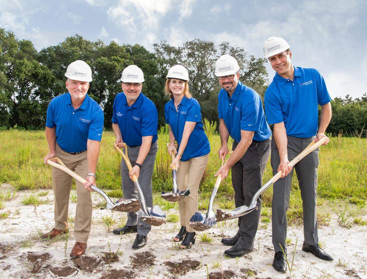 Florida Cancer Specialists CEO Brad Prechtl, and doctors Fadi Kayali, Janice F. Eakle, Miguel Pelayo, and Amir Harand break ground for a new treatment facility at Lakewood Ranch.